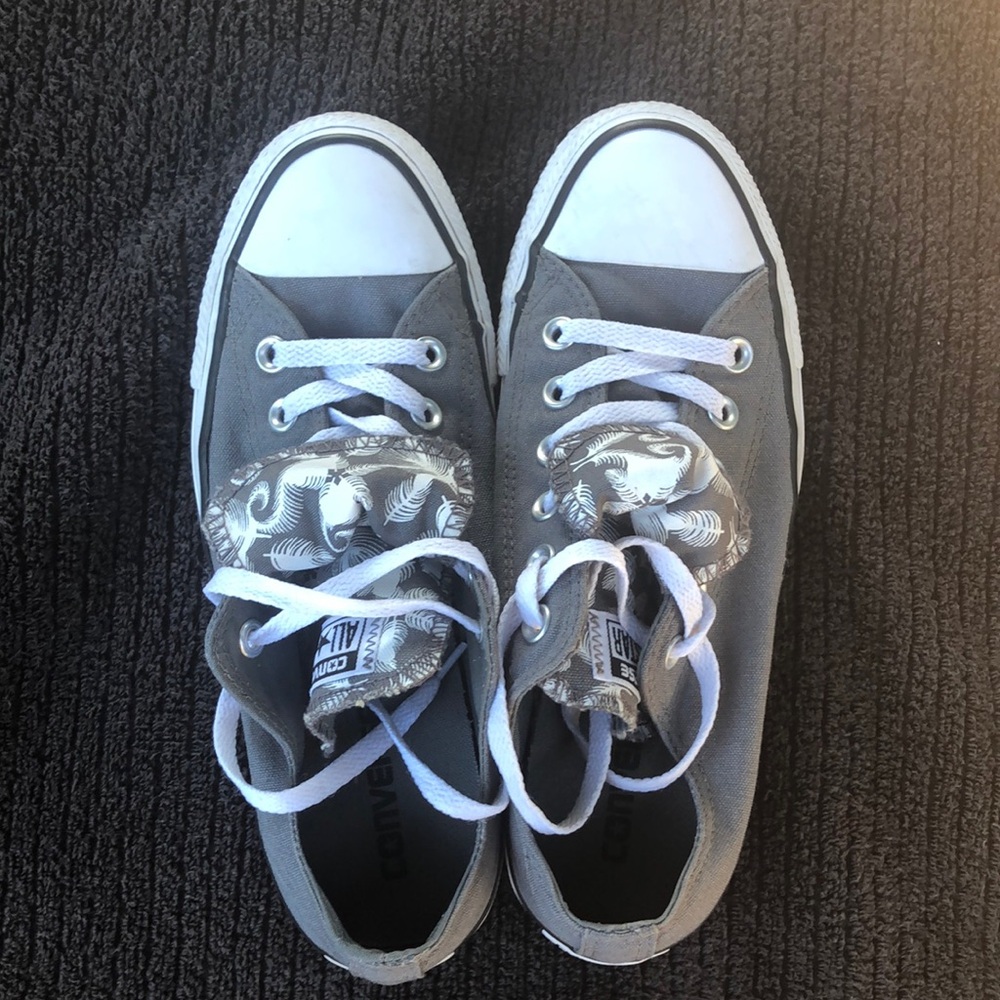 Women’s size 8 double-tongue Converse . Great pre-owned condition.